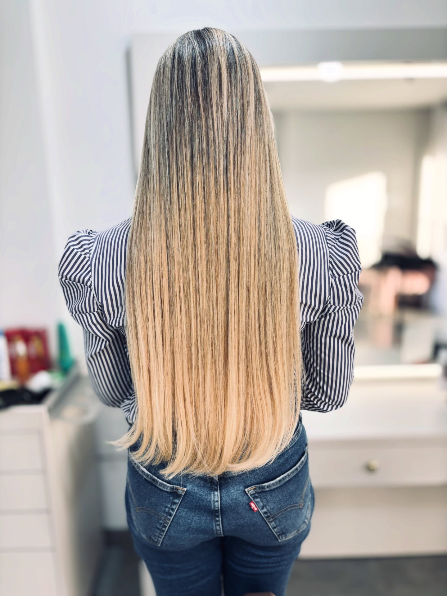 Publicação do Espaço Mega Hair mostrando transformação capilar